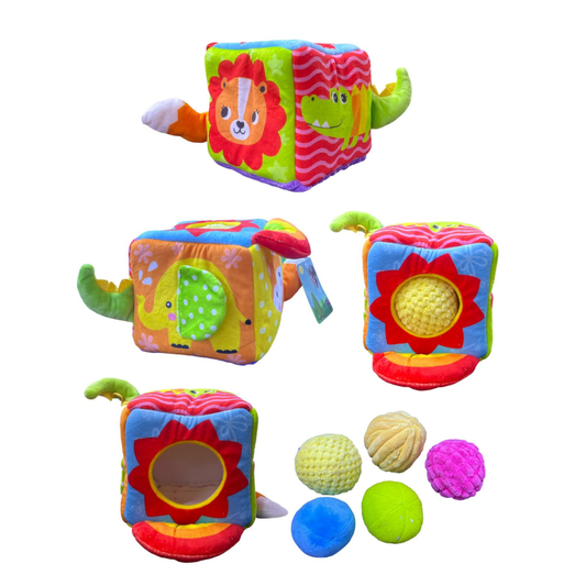 Cubo sensorial de telas con pelotas