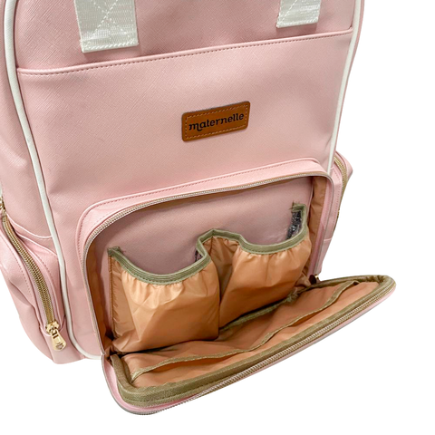 Mochila Pañalera Rosada Maternelle 2 en 1 Convertible a cambiador portátil